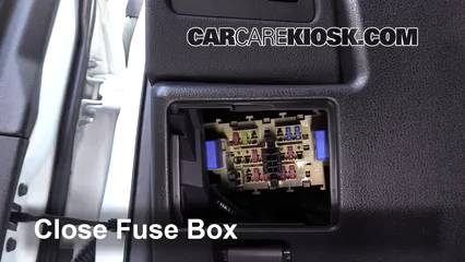 where is the fuse box on a 2013 nissan rogue